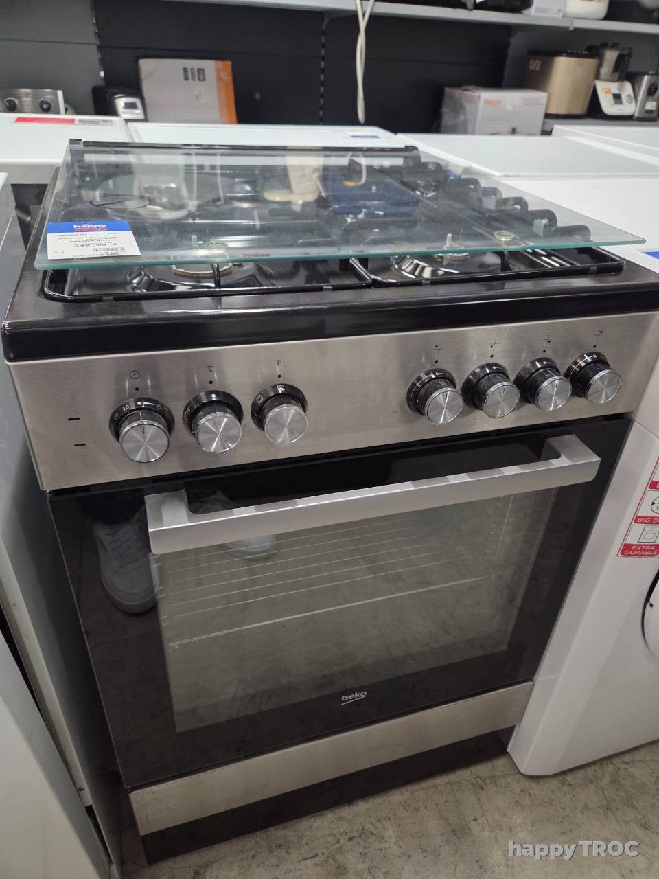 Gaziniere mixte butane finition inox Beko garantie 2 ans