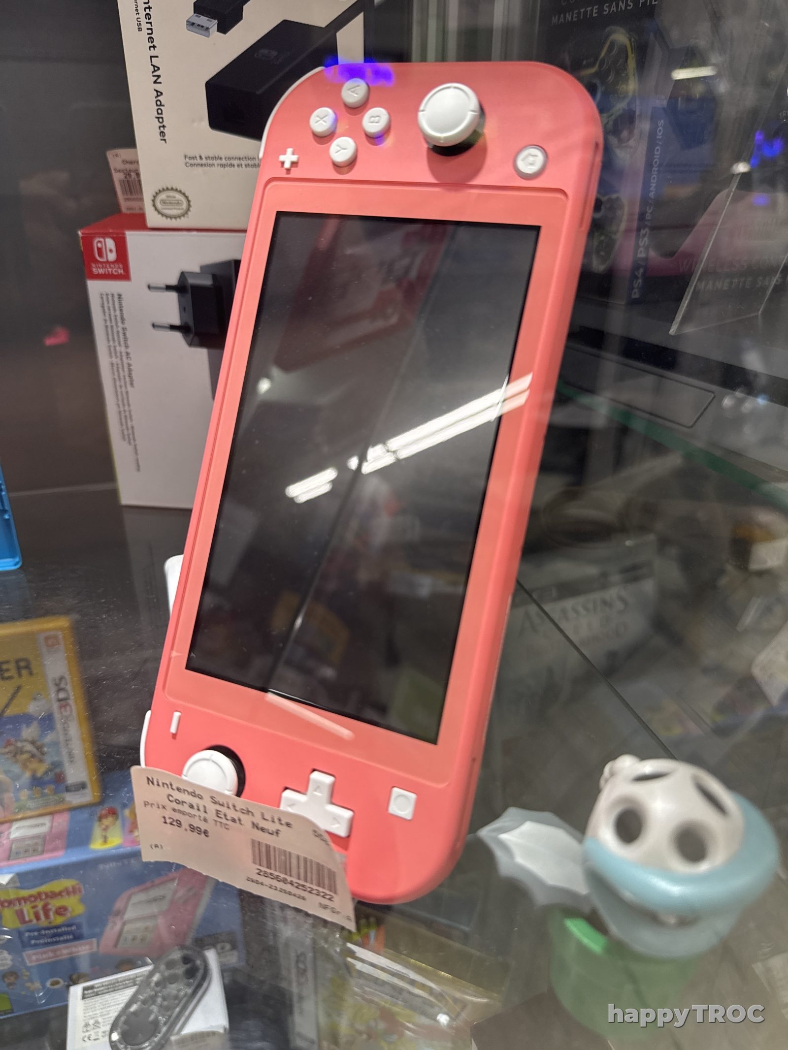 Nintendo, console de jeux switch, Lite, couleur corail, état neuf
