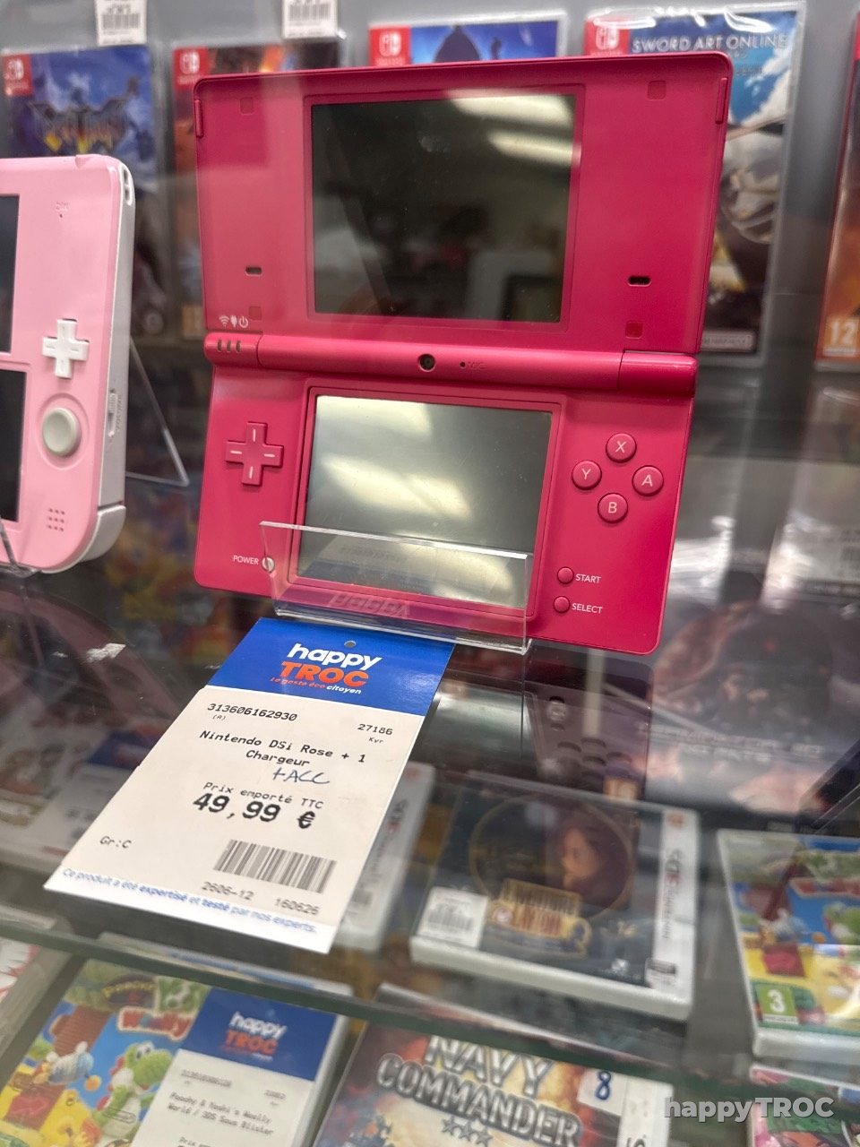 Console de jeu, Nintendo DSI, rose avec un chargeur et accessoire